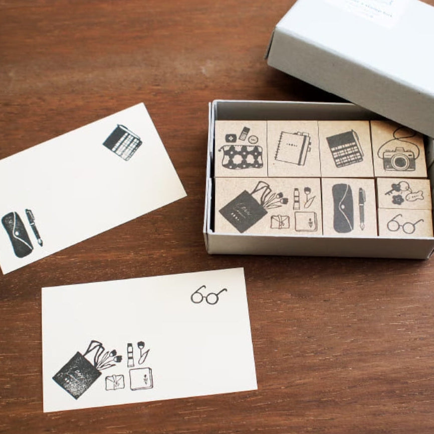 Step into a world of everyday charm with the Creator’s Stamp Box – Inside the Bag, a delightful collaboration between Stamp Marche and Sonomi Kogei. This curated set captures the little treasures we carry with us—perfect for adding personality and storytelling to your journal pages, planners, scrapbooks, and creative projects.
Each stamp is crafted with a solid wooden mount and high‑quality rubber, giving you crisp, clean impressions every time.
This set includes 8 stamps.
Stamp size: approx.&nb