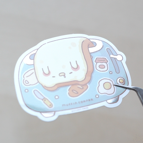 A sticker of floppy Muffinmaru toast struggling to get up in the morning. This sticker has a shiny mirror-like finish on some parts of the toaster for some extra flare. This durable sticker is great for decorating water bottles, laptops, suitcases, and much more!
Dimensions: 2.8" x 2" (7.1cm x 5.1cm)
Material: PET
Waterproof
Quantity: 1 sticker