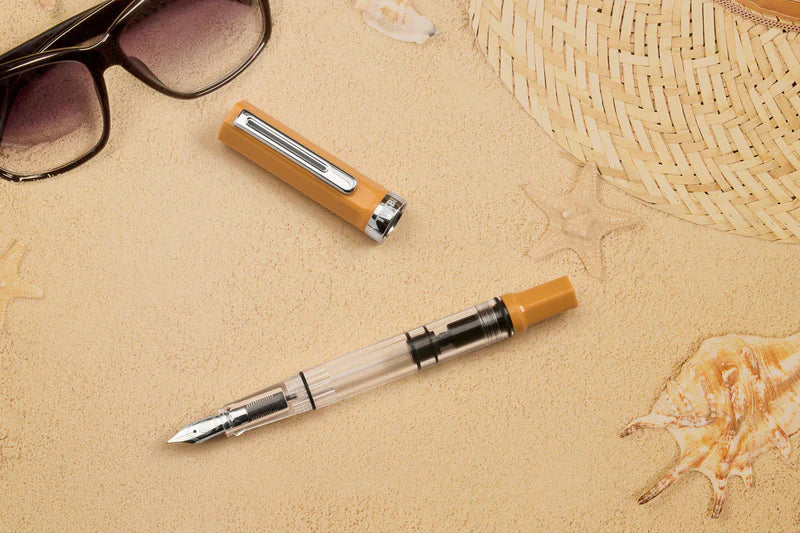 TWSBI ECO Bahama Yellow Fountain Pen
Comes in EF, F, M, B, Stub1.1 nib choices
Colors: Yellow/Clear
Pen cap is able to post onto the back of the pen
Piston Filler Fountain pen.
Simply unscrew the end cap, dip into ink, screw back the end cap, and your done! Ready to write!!