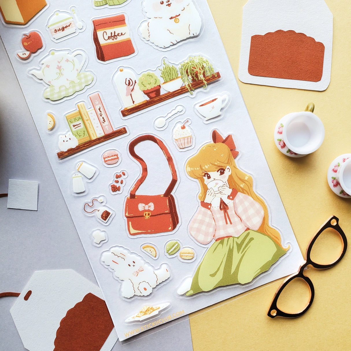 βπ Set the kettle on and settle in for the sweetest tea time daydream. This pastel-perfect sticker sheet is filled with gentle tea breaks, clinking cups, sugar-dusted treats, and all the little comforts that make staying in feel special. From quiet sips and happy snacks to fluffy pups keeping you company and bows tucked into every cozy corner, each sticker captures that warm, unhurried feeling of tea time when the world softens, the tea stays hot, and everything feels just right.
Art by: Aanchal