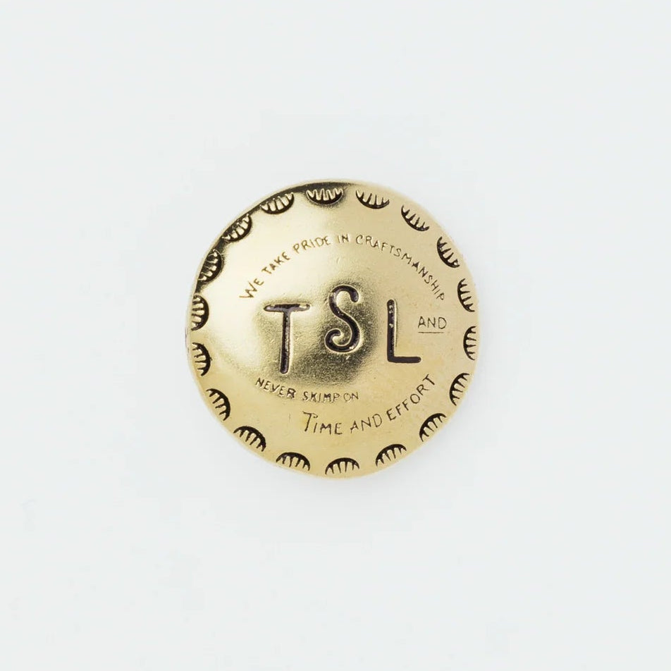 The SUPERIOR LABOR Brass Concho is a stylish, functional accessory designed to add a touch of flair to everyday life. Crafted from solid brass, it is available in multiple designs including circle, star, oval, and heart.