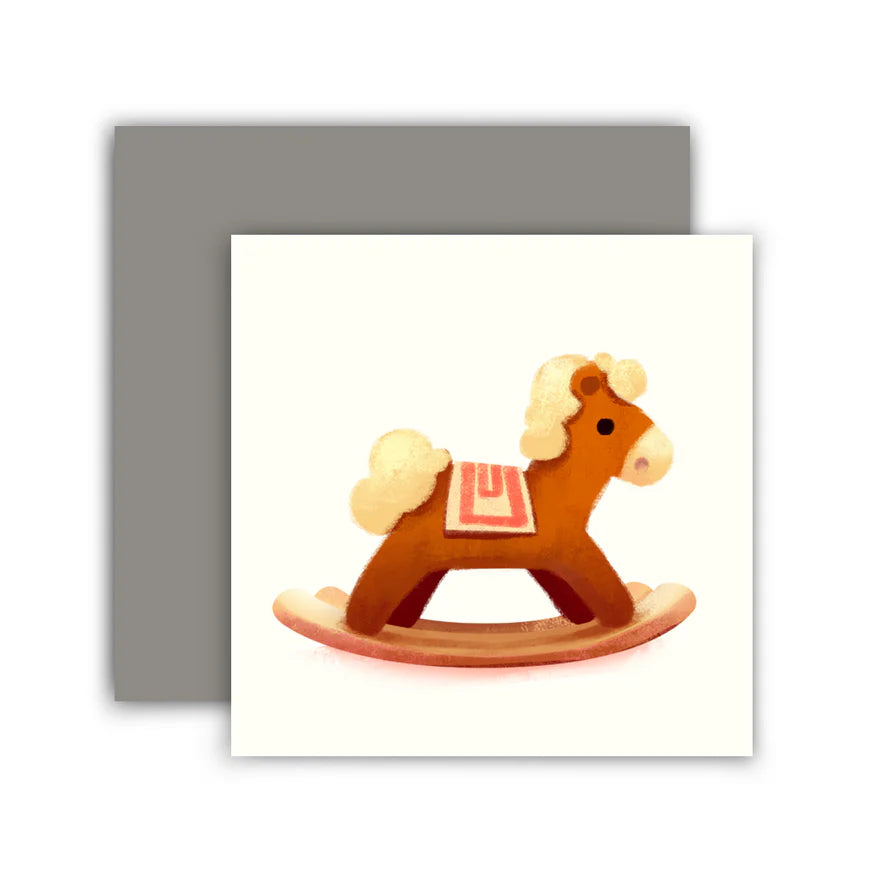 This illustration features an illustrated wooden horse against a white background with a blank interior to write your own greeting.
Single card includes 1 folded card + 1 matching envelope
Blank inside
Dimensions: 2.75 x 2.75 inch
Designed and illustrated by Aggie Cheung for The Little Red House