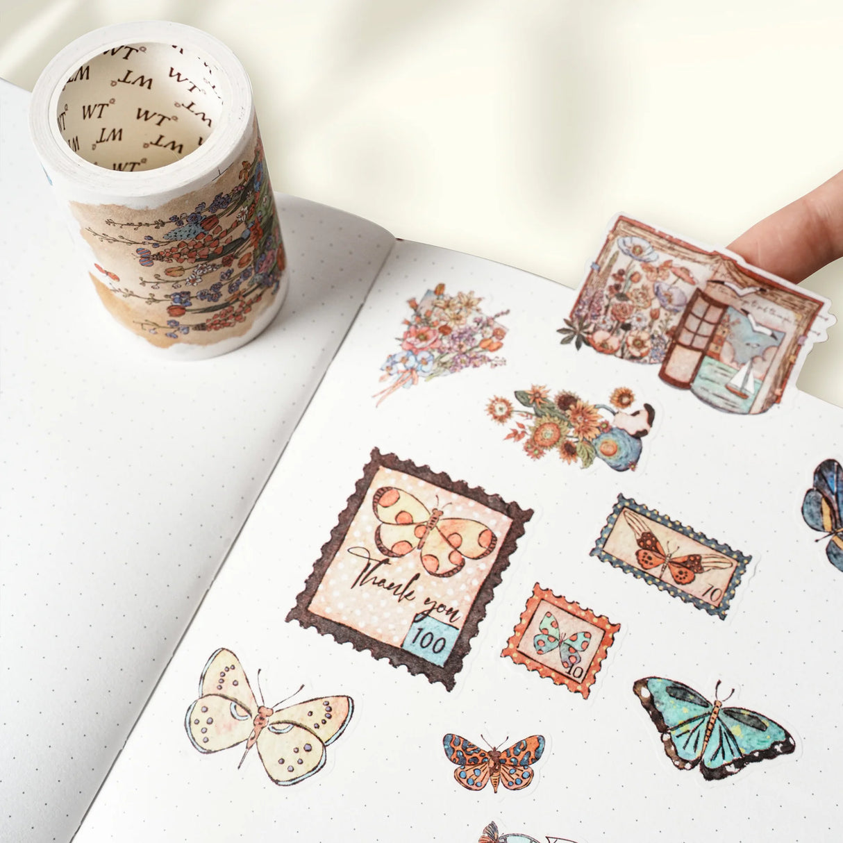 Love butterflies? Obsessed with vintage stamps? This one’s for you. Our Stamped Wings Washi Tape Sticker Set brings together dreamy butterflies, delicate florals, and charming postal vibes — all wrapped up in a washi tape that peels off like stickers! Perfect for decorating letters, journals, planners, or anything else that could use a flutter of whimsy and a sprinkle of nostalgia.
