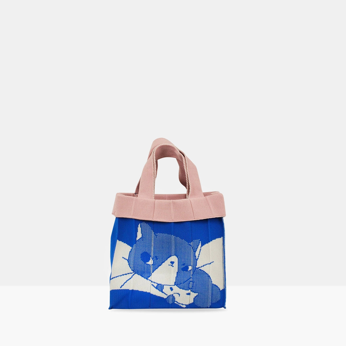 The Co-Knitty bag is a small hand carry bag perfect for your necessities such as phone and wallet.
Recycled polyester (one tote bag is made from approximately 1.5 recycled plastic bottles)
A cute hand carry at the size of 20 x 20cm x 6.5cm(depth), 188g
Easily clean the bag by tossing it into the washing machine (laundry net recommended)
Wrinkle free, so feel free to fold away when you don't need it!
Made locally in Japan