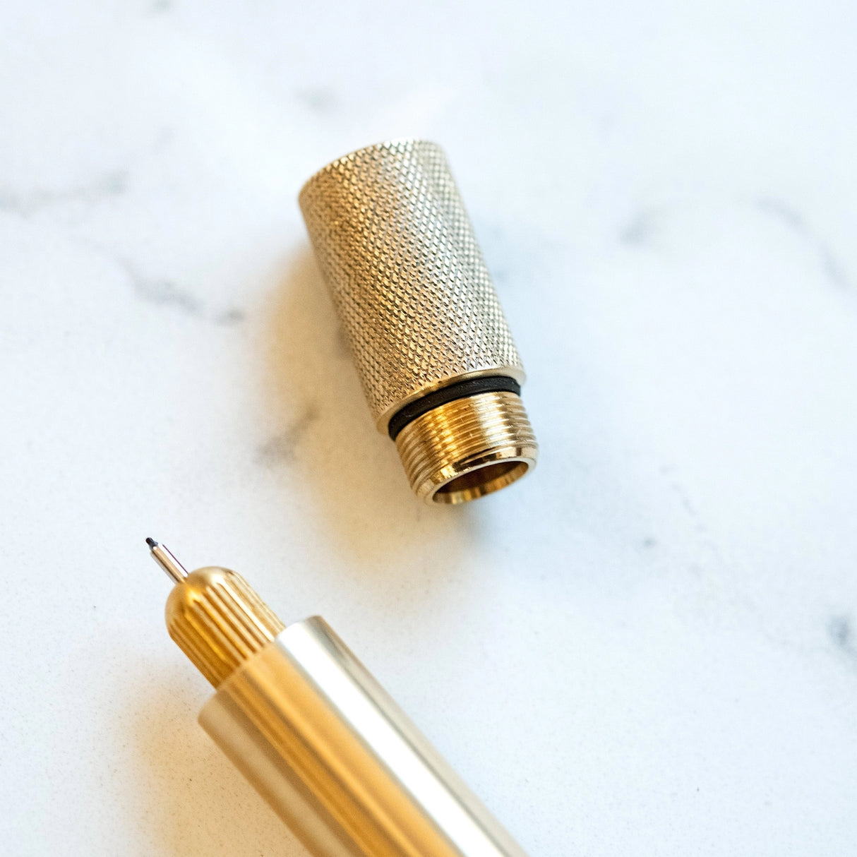 Tom's Studio - Lumos Mini Refillable Pen - Brass
A Mini Pen for Your Big Ideas
Introducing the Lumos Brass: Special Edition, where exceptional British craftsmanship meets iconic design. Infinitely refillable fineliner, writing, and brush pen, including 11 interchangeable tips. Tom designed the Lumos as an answer to disposable pens. One of the biggest culprits is the humble biro, of which the unfathomable number of 100 Billion now reside in landfill!