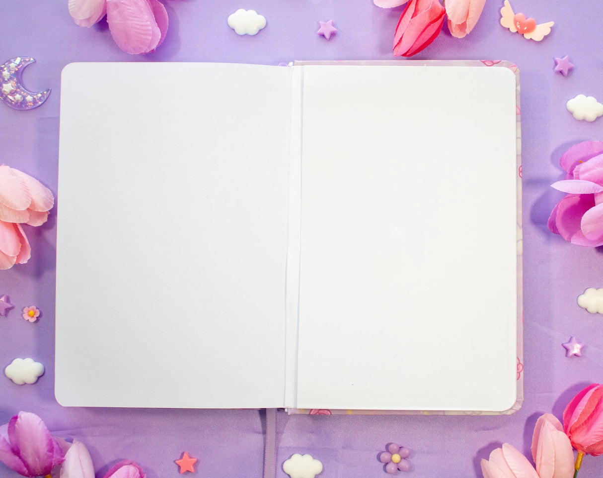 Unicorn Eclipse - Pastel Academia Dotted Journal
✧Size & Materials✧
Size: A5 (approximately 5.8 x 8.3 inches)
Smooth hardcover, rounded corners
160 dot grid pages, 140 gsm
Includes ribbon bookmark, elastic band, and back pocket