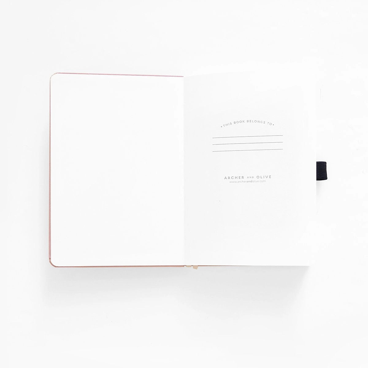 A dreamy notebook in gentle lilac vegan leather, inspired by classic library bindings. Subtle geometric embossing frames a delicate open-book motif, creating a clean, elegant design that appeals to book lovers, writers, and everyday creatives.