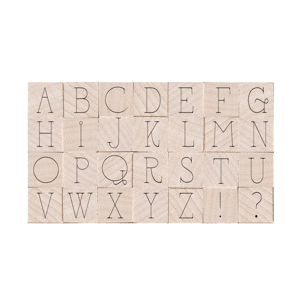 The Hero Arts Printer's Type Alphabet set contains 28 woodblock stamps in a thin whimsical font.
Hero Arts woodblock stamp sets are designed and packaged for stamping perfection. They are mounted on North American maple from sustainable forests for precision and long-lasting quality. Each set features original designs from our award-winning design team that matches the styles and trends of the day.