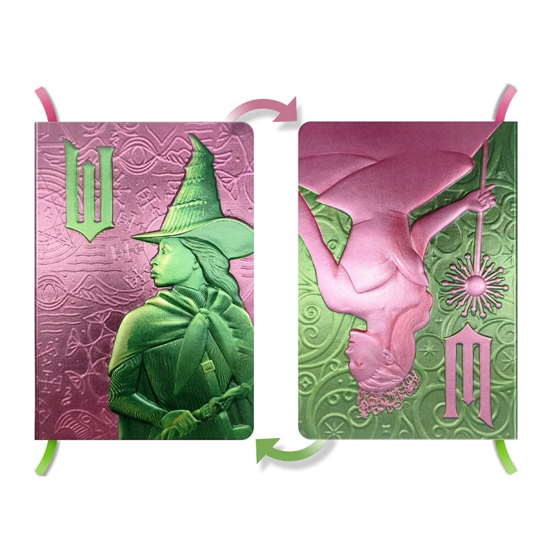 The perfect place to note your thoughts in style, this 184-page collectible journal is a stylish gift for any Wicked fan. This reversible journal can be flipped to present either Elphaba Thropp’s or Glinda Upland’s profiles, with internal pages in soft shades of green and pink and with a satin placeholder ribbon.
QUALITY CONSTRUCTION: This journal features a stunningly detailed, molded hardcover with metallic finish, 184-ruled pages of premium paper, plus a satin ribbon marker to ensure you never lose your