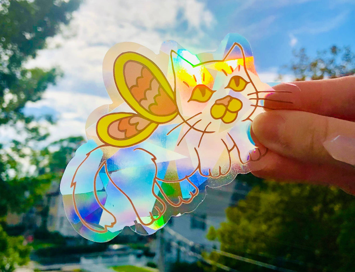 Atrapasol con forma de gato de hadas y arcoíris