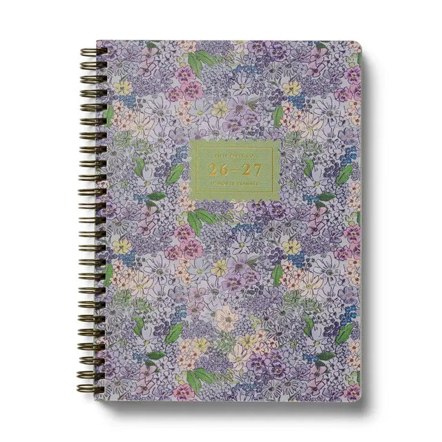 This extended, 17-month version of our softcover spiral planner features a printed bookcloth cover with gold foil detailing. In addition to weekly and monthly views, the planner includes space for weekly notes, a list of celebrations, and pockets for storage.&nbsp;

DETAILS

&nbsp;Printed in full color with foil stamped year
Natural white text paper interior
August 2026-December 2027
Monthly and weekly views
Space for notes for each week
List of celebrations
Pockets for storage
Spiral bound
6.25" W x 8.5" L