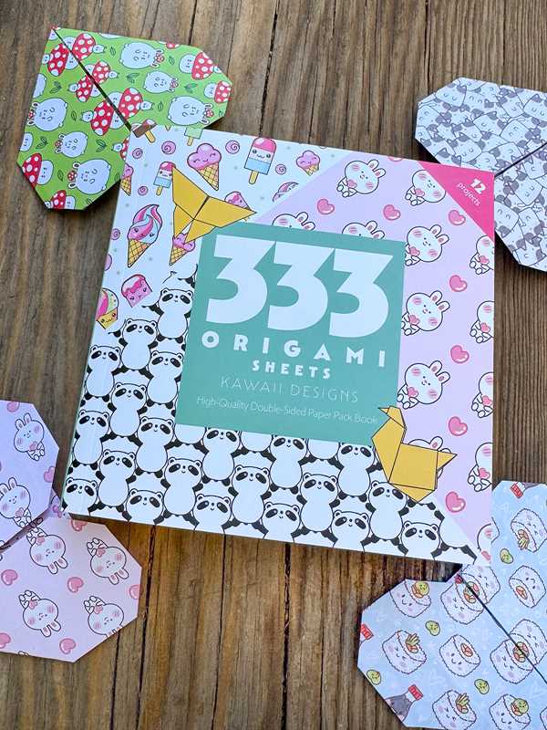 Create charming origami art printed with adorable illustrated designs.

Get started creating origami art with this chunky, colorful, and inspiring book of 333 sheets of origami-weight paper in 60+ unique designs! Adorable illustrated designs from cute and kawaii animals to kooky foods are printed on a wide variety of colored paper. The paper is a perfect weight and size for origami folding techniques, suitable for beginner and experienced origami artists alike.