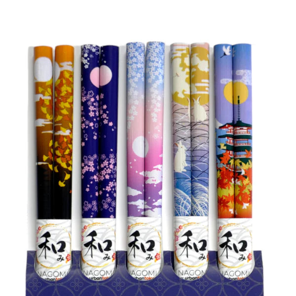 This set includes 5 sets of chopsticks with a red floral pattern inside a gift box.&nbsp;

Material: Bamboo&nbsp;
Size: 9"L
Origin: China
