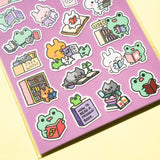 This is part of a new series of sticker sheets that feature different "days". There are 23 individual stickers on the sheet full of bizness success.

They are vinyl stickers on a clear plastic sheet with a backing card and packaging that's ready to display.

The whole packaging is 3.8 x 8.75" and is ready to hang. The sticker sheet is 3.75 x 5.8"