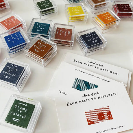 The Stamp It Colors! Mini Ink Pads which are conveniently portable size for creative projects on the go! These ink pads come in a variety of vibrant colors that can bring life to your journal pages by adorning them with endless designs. Additionally, they are water based and perfect for layering to create intricate details for artistic projects such as making cards and scrapbooking.