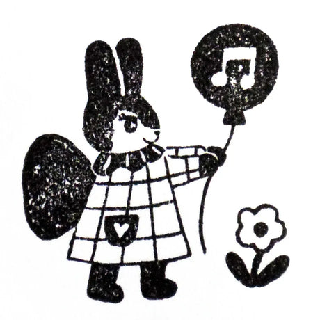 Stamp by illustrator Aiko Nukawa.
The rabbit fairy holds a balloon—a very cute design.
It cutely brightens up the blank spaces on cards and notebooks.