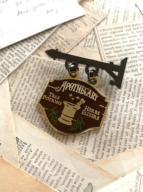 The Creeping Moon - Apothecary Shop Sign Enamel Pin