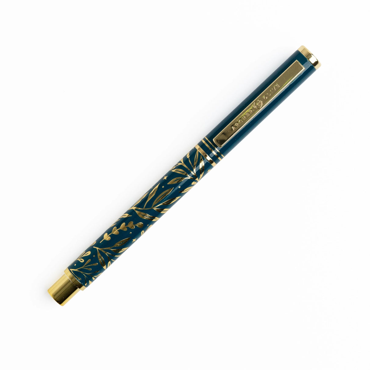 A beautifully designed craft knife featuring a deep teal barrel adorned with gold botanical detailing. With its precision blade and sturdy metal construction, this tool brings both function and elegance to journaling, scrapbooking, and detailed paper crafting.

Specs &amp; Details:

Material: Metal body with gold accents
Design Theme: Teal barrel with gold botanical illustration
Blade: Precision craft blade (replaceable)
Features: Removable cap for safe storage, textured grip for control
Use: Ideal for cutt