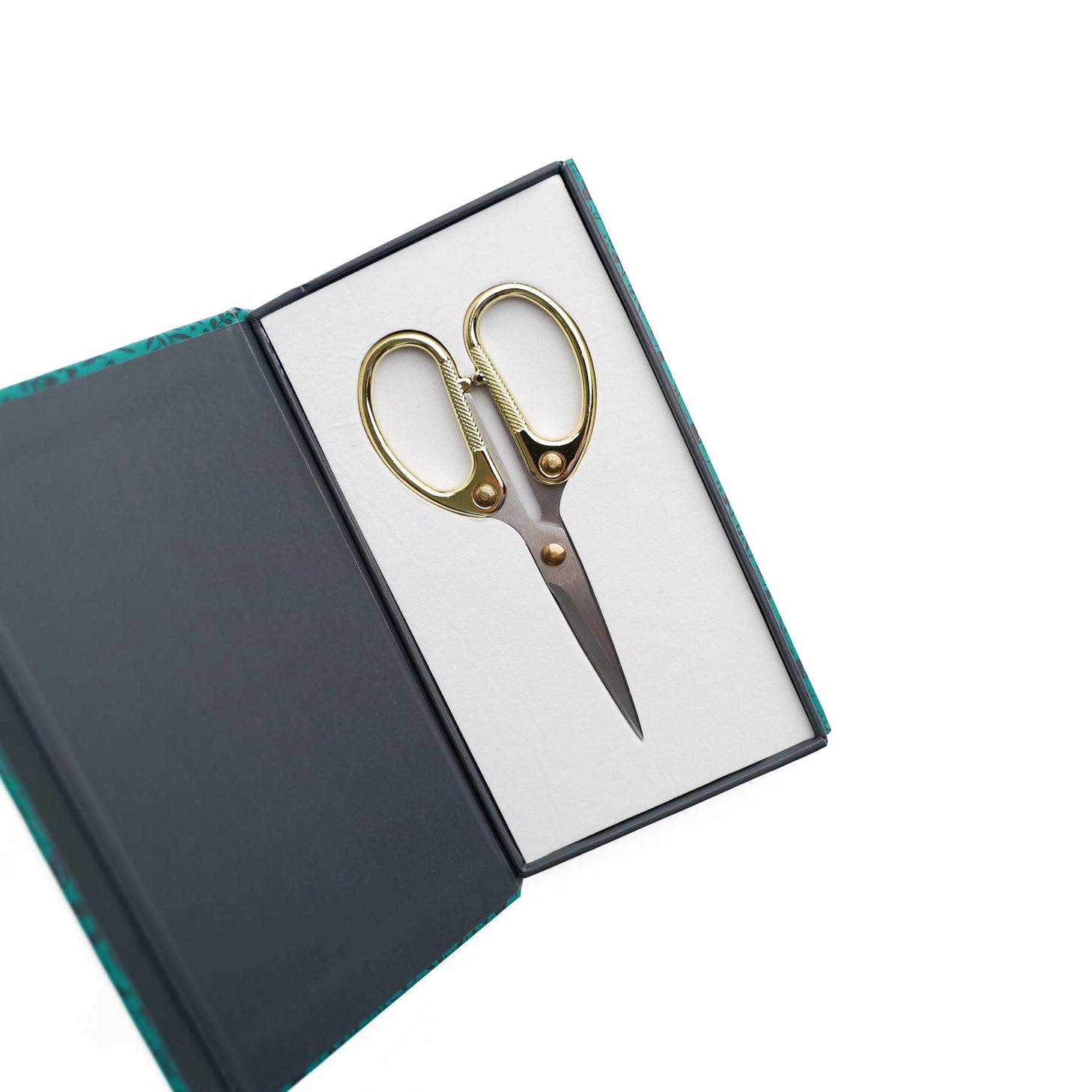 Archer and Olive Gold-Handled Stationery Scissors

Introducing our Gold-Handled Stationery Scissors, a perfect blend of elegance and functionality. With their stunning gold-colored handles and sharp stainless steel blades, these scissors offer precise cuts and a comfortable grip. Whether you're crafting, trimming paper, or tackling creative projects, these scissors deliver exceptional performance every time.

Designed for durability and comfort, they provide a balance of maneuverability and control. Make a 