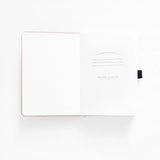 Quiet, expansive, and full of wonder — the Meteor Shower Notebook captures the magic of watching the night sky come alive. A deep, moody cover is scattered with delicate shooting stars, creating a sense of calm movement and cosmic possibility. It’s a notebook made for late-night thoughts, creative sparks, and ideas that arrive like falling stars.