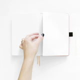 Step into a quiet night where ideas glow like fireflies. The Moonlit Garden Notebook captures the calm of a starry sky framed by wildflowers, inviting you to pause, breathe, and fill each page with inspiration. With soft moonlit tones and delicate detailing, it’s a peaceful companion for journaling, planning, or creative reflection.