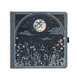 Step into a quiet night where ideas glow like fireflies. The Moonlit Garden Notebook captures the calm of a starry sky framed by wildflowers, inviting you to pause, breathe, and fill each page with inspiration. With soft moonlit tones and delicate detailing, it’s a peaceful companion for journaling, planning, or creative reflection.