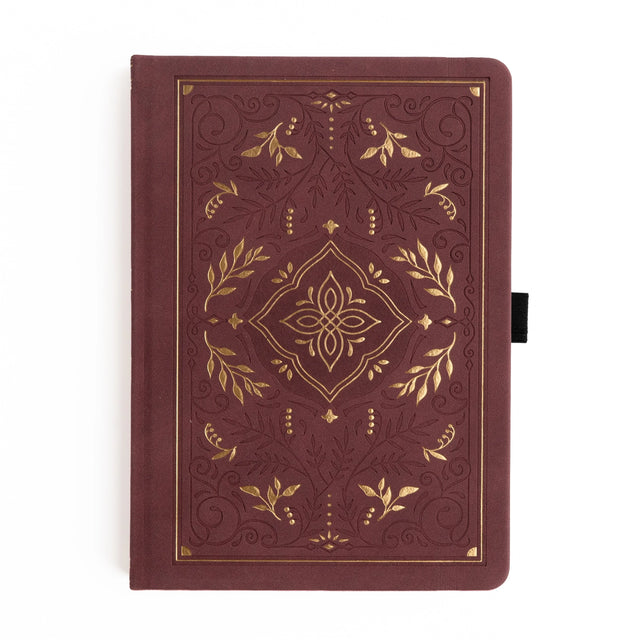 Step into a world of quiet enchantment. The Storybook Notebook in Plum pairs rich jewel tones with ornate gold detailing, creating a journal that feels like a treasured vintage tale come to life. Whether you're capturing daily reflections, writing new ideas, or planning your next great adventure, every page feels like stepping into your own story.