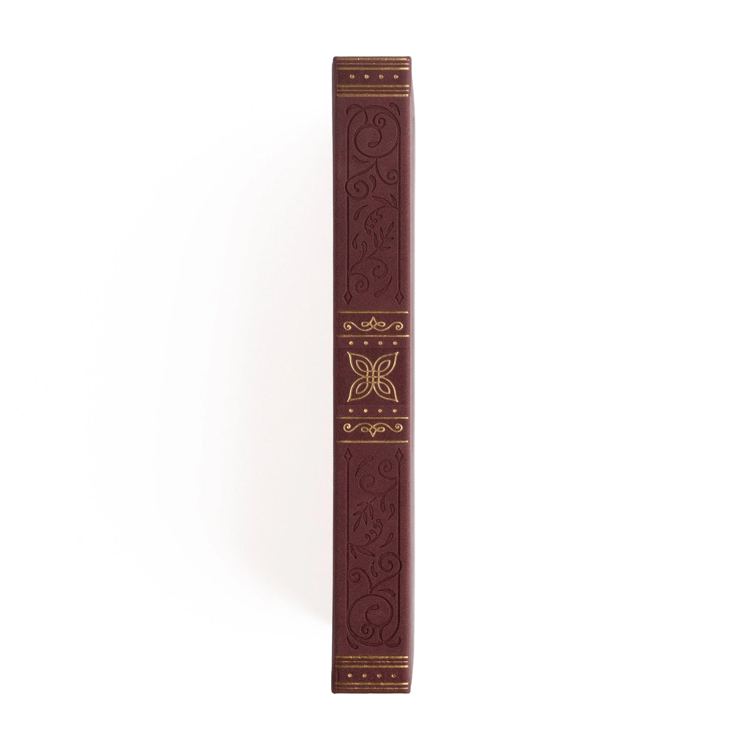 Step into a world of quiet enchantment. The Storybook Notebook in Plum pairs rich jewel tones with ornate gold detailing, creating a journal that feels like a treasured vintage tale come to life. Whether you're capturing daily reflections, writing new ideas, or planning your next great adventure, every page feels like stepping into your own story.