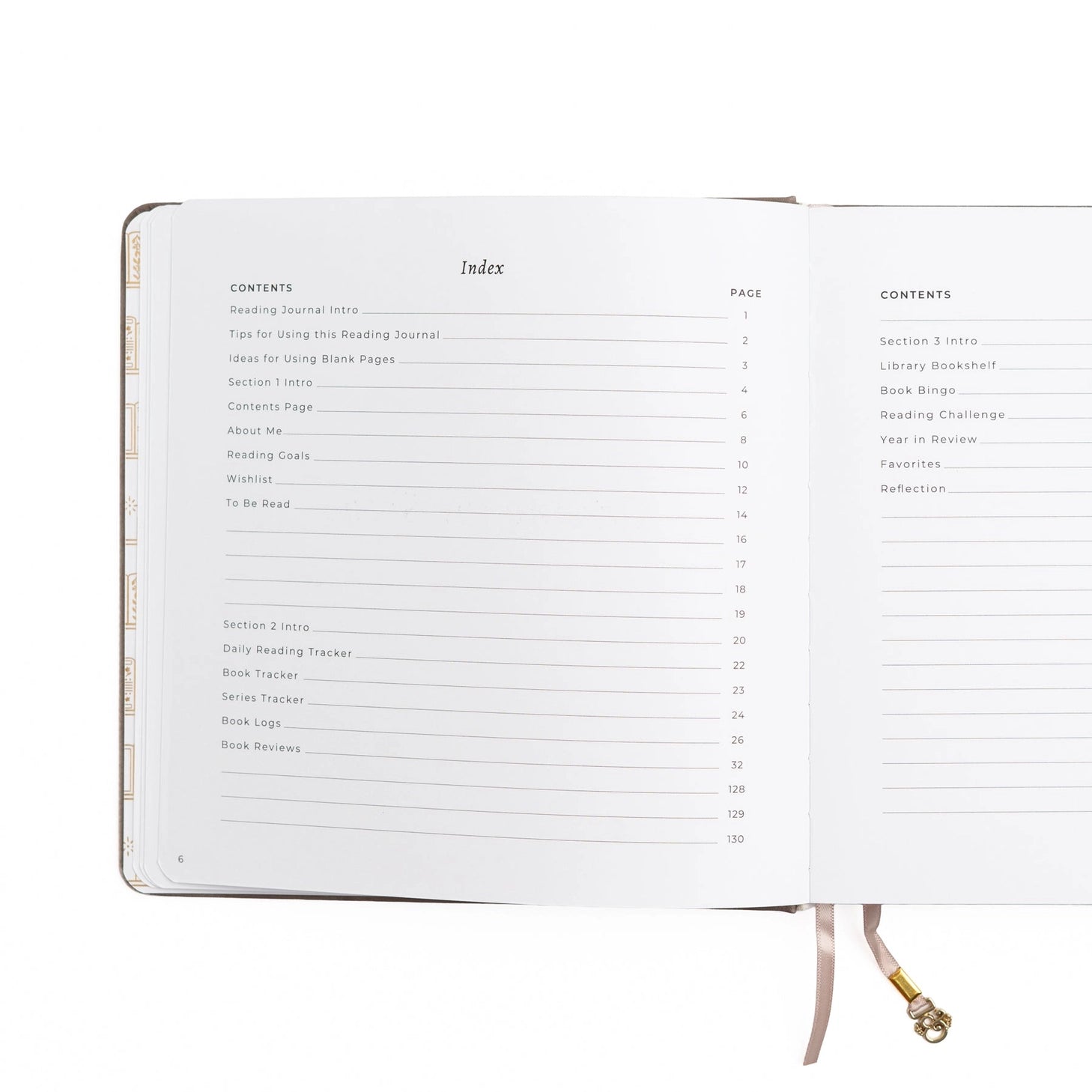 A dreamy Reading Journal in gentle lilac vegan leather, inspired by classic library bindings. Subtle geometric embossing frames a delicate open-book motif, creating a clean, elegant design that appeals to book lovers, writers, and everyday creatives.