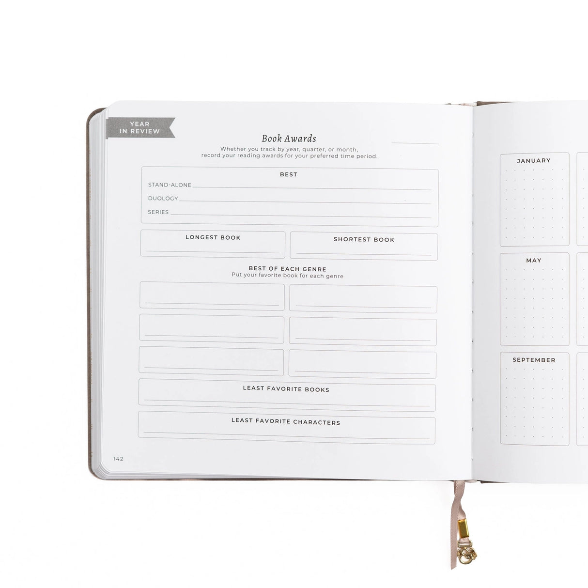 A dreamy Reading Journal in gentle lilac vegan leather, inspired by classic library bindings. Subtle geometric embossing frames a delicate open-book motif, creating a clean, elegant design that appeals to book lovers, writers, and everyday creatives.