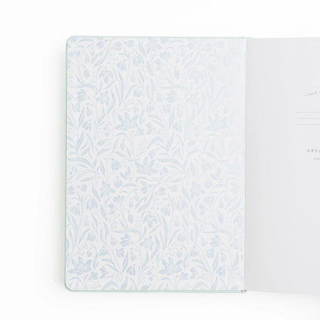 Like the first blooms after a long winter, the Snowdrops Notebook celebrates hope, renewal, and quiet strength. Wrapped in a soft cotton cover, this journal brings a tender, natural texture to your creative ritual. Whether you’re setting intentions, sketching ideas, or documenting growth, each page invites you to slow down and reconnect with what matters most.

✨ Features You’ll Love

160gsm ultra-thick pages—perfect for pen, marker, or watercolor with no ghosting or bleeding
Available in Dot Grid, Lined, o
