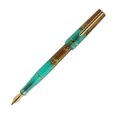 BENU presents the newest Haute Collection — a line of elegant, fashion-inspired pens that blend classic charm with bold, modern flair. The designs include both subtle and vibrant styles, showcasing BENU’s signature glitter and color artistry. Each pen features a faceted body with alternating wide and slender facets, complemented by either gold-plated or chrome-plated trims for a sleek, timeless look.

Seal and caramel tones swirl together, flecked with radiant gold. Lush evokes runway opulence — bold, textu