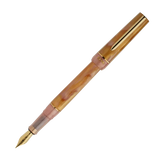 BENU presents the newest Haute Collection — a line of elegant, fashion-inspired pens that blend classic charm with bold, modern flair. The designs include both subtle and vibrant styles, showcasing BENU’s signature glitter and color artistry. Each pen features a faceted body with alternating wide and slender facets, complemented by either gold-plated or chrome-plated trims for a sleek, timeless look.

Lustre pen glows with warm swirls of amber and blush, finished in radiant gold trim.Quietly luxurious, Lust