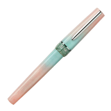 BENU presents the newest Haute Collection — a line of elegant, fashion-inspired pens that blend classic charm with bold, modern flair. The designs include both subtle and vibrant styles, showcasing BENU’s signature glitter and color artistry. Each pen features a faceted body with alternating wide and slender facets, complemented by either gold-plated or chrome-plated trims for a sleek, timeless look.

Soft shades of rose and mint melt together in Perle, accented by a sparkling band. As fresh as spring light