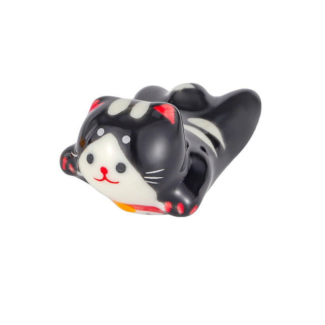 Black Cat Chopsticks Rest

Porcelain black cat chopstick rest / pen rest.