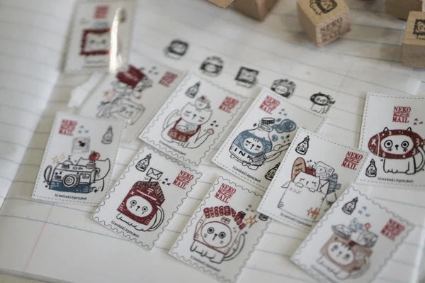 Box size: 4 x 3 x 3 cm

Packed with cuteness, this tiny treasure features 6 different mini stamp designs - plus a PET sticker pack.

The stamps are made of industrial high grade red rubber with the finest details. It is mounted by hand on re-purposed wood, hand-picked from various sources from old furnitures to jungle excursions! As all stamps are assembled, cut, sanded by hand, size and shape may vary slightly. Wood material will differ depending on what the forest elves bring!
