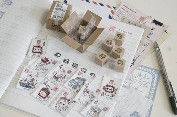 Box size: 4 x 3 x 3 cm

Packed with cuteness, this tiny treasure features 6 different mini stamp designs - plus a PET sticker pack.

The stamps are made of industrial high grade red rubber with the finest details. It is mounted by hand on re-purposed wood, hand-picked from various sources from old furnitures to jungle excursions! As all stamps are assembled, cut, sanded by hand, size and shape may vary slightly. Wood material will differ depending on what the forest elves bring!