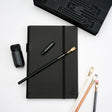 A great way to get started on the Blackwing journey. Give the gift of high-quality Blackwing pencils, paper &amp; accessories — all in one box set.

Includes a Medium Black A5 Slate Notebook, each of our core pencils (602, Matte, Pearl, Natural), One-Step Long Point Sharpener, and Point Guard -- all packaged in a box set.