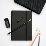 A great way to get started on the Blackwing journey. Give the gift of high-quality Blackwing pencils, paper &amp; accessories — all in one box set.

Includes a Medium Black A5 Slate Notebook, each of our core pencils (602, Matte, Pearl, Natural), One-Step Long Point Sharpener, and Point Guard -- all packaged in a box set.