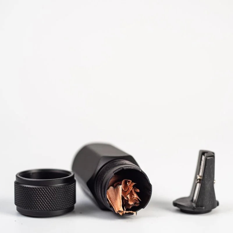 The Blackwing One-Step Long Point Sharpener creates a long, curved pencil point that resists breakage. Its convenient compact design is small enough to fit in the palm of your hand or as a permanent part of your everyday carry. This sharpener is available in black, grey, and white.