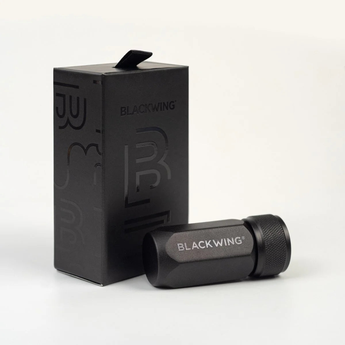 The Blackwing One-Step Long Point Sharpener creates a long, curved pencil point that resists breakage. Its convenient compact design is small enough to fit in the palm of your hand or as a permanent part of your everyday carry. This sharpener is available in black, grey, and white.