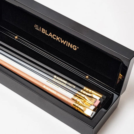 The Blackwing Piano Box is a beautiful addition to any desk or home office. This sleek and stylish gift set comes bundled with 12 of our iconic premium graphite pencils inside the box, available in Blackwing Matte, Blackwing 602, Blackwing Pearl, Blackwing Natural, or 3 of each. This pencil box is perfect for gifting or upgrading your workspace.