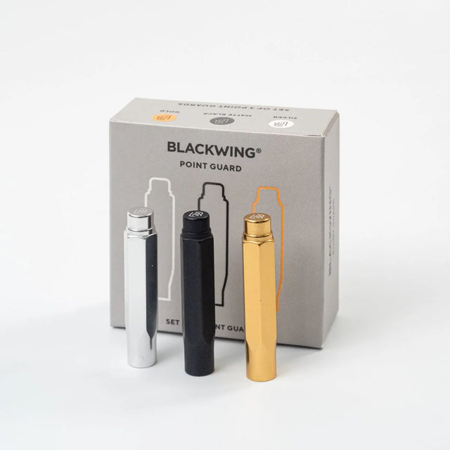The Blackwing Point Guard is designed to ensure your Blackwing pencil gets wherever you’re going in one piece. Crafted out of lightweight, machined aluminum, the Point Guard goes over the point of your Blackwing pencil, keeping it safe in your bag, pocket, or pencil roll. The tip of your pencil “floats” inside the cap to protect your point against unexpected drops or jams.

Point Guards are available in matte black, matte white, bright gold, bright silver, or a mixed set of 3 (gold, silver, and black).