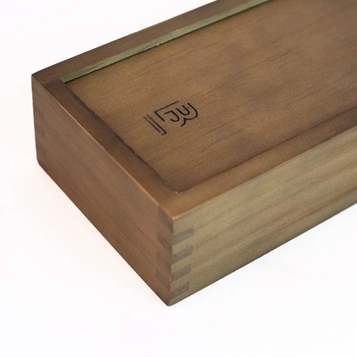 The Blackwing Rustic Box features your choice of 12 premium Blackwing graphite pencils and our reliable Two-Step Long Point Sharpener. Choose from 12 Matte pencils,12 602 pencils, 12 Pearl pencils, 12 Natural pencils, or 3 of each. The aged pine pencil box slides open to reveal the Blackwing pencils and a black cork-lined interior. The smooth stationery box is perfect for any workspace, office, or desk.