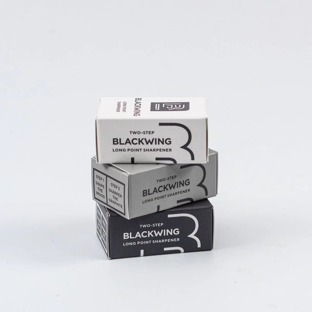 The Blackwing Two-Step Long Point Sharpener creates a sturdy pencil point using a two-step sharpening process. The first hole sharpens the wood, and the second hole precisely sharpens the graphite core, resulting in a strong, sharp point that resists breakage.