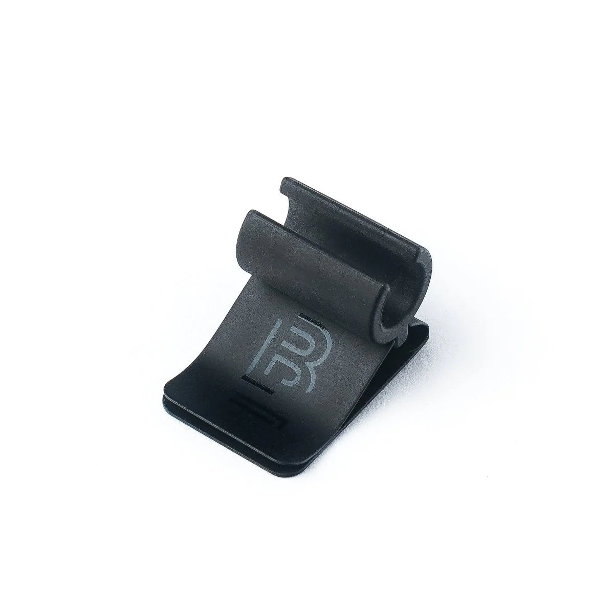The Blackwing Notebook Clip is designed to keep your pencil and paper together. The clip is made of aluminum and finished with our signature matte black texture. Once you attach the reusable clip to your notebook, your pencil snaps into a durable thermoplastic polymer that won't scuff the lacquer. Perfect for everyday carry—clip it onto your spiral notebook, legal pad, memo book, or reading book to keep your stationery organized.