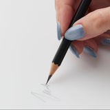 The Blackwing Matte pencil is ideal for drawing, music writing, woodworking, and anyone who prefers a soft, dark line. The Blackwing Matte contains the same soft graphite formulation as the since renamed "Blackwing Palomino."This graphite pencil glides effortlessly for bold shading and smooth writing. Available in Black, Green, and Red.

Blackwing Matte pencils come in a 12-pack gift box that doubles as a pencil cup. Features a Graphite Identification Stamp indicating its "SOFT" graphite core.

All Blackwin