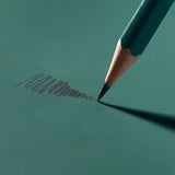 This colorway has a matte green finish, copper imprint, copper ferrule, and taupe eraser. It features a “SOFT” pencil graphite indicator stamp on the barrel. This Blackwing graphite pencil is ideal for musicians, woodworkers, artists, and anyone who prefers a soft, satisfying dark line. The Blackwing Matte pencil is the softest of the four popular core Blackwing models.

Blackwing Matte pencils come in a 12-pack gift box that also doubles as a pencil cup. The Blackwing Matte has the soft same pencil graphit