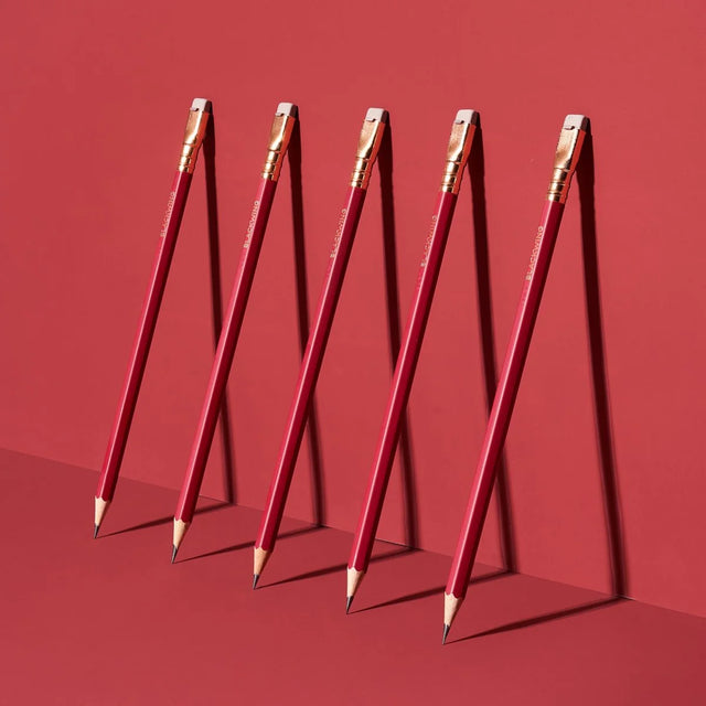 This colorway has a matte red finish, copper imprint, copper ferrule, and light gray eraser. It features a “SOFT” pencil graphite indicator stamp on the barrel. Not to be confused with our red core pencils, this is a graphite pencil with a red barrel. This pencil is ideal for musicians, woodworkers, and anyone who prefers a soft, dark graphite line. The Blackwing Matte is the softest of the four core Blackwing models.

Blackwing Matte pencils come in a 12-pack gift box that also doubles as a pencil cup. The