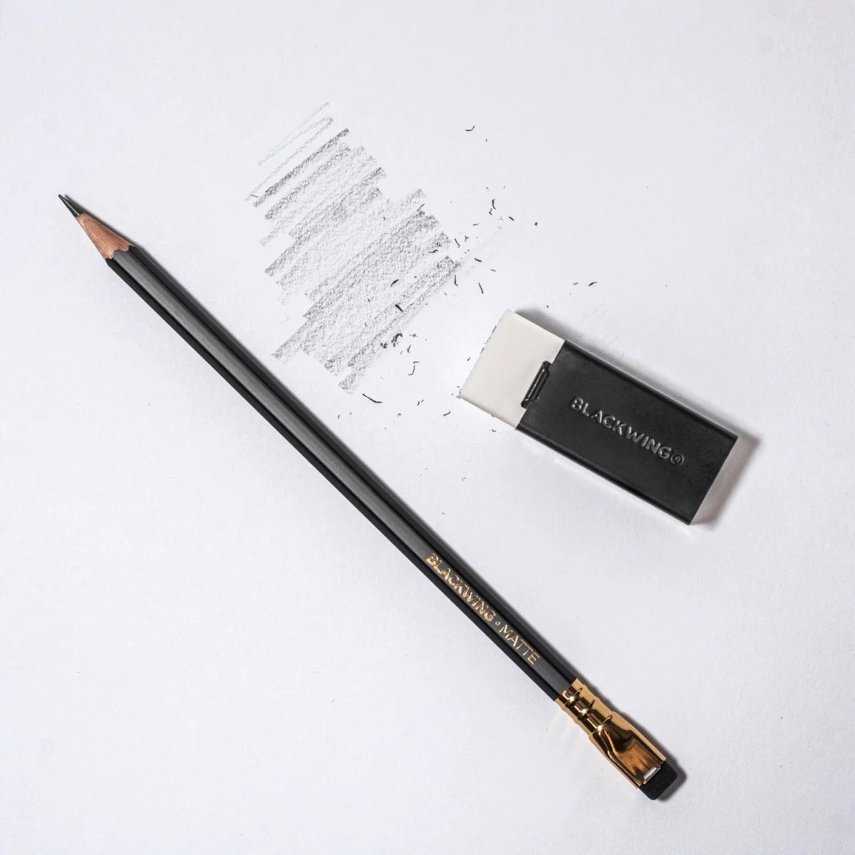 We took the iconic design of our eraser clip and adapted it into a sleek handheld form that feels great to use.

The eraser is made of a special soft material that erases the dark lines of our graphite cleanly and easily. The holder is made of durable aluminum that lets you get a solid grip while erasing. It also includes a jumbo-sized version of the iconic Blackwing clip, so you can extend the eraser as you use it.